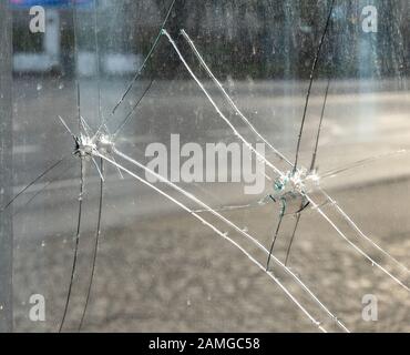 Crime scene bullet holes in the window Stock Photo