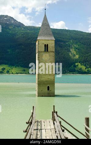 Italy, sunken church tower in Reschen Lake - Lago di Resia - in South Tyrol Stock Photo