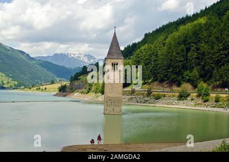 Italy, sunken church spire in Reschen Lake - Lago di Resia - in South Tyrol Stock Photo