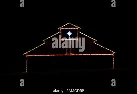 large barn decorated with Christmas lights in Franklin, Tennessee Stock Photo