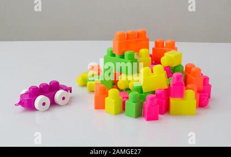 colorful plastic toy blocks isolated on white background Stock Photo
