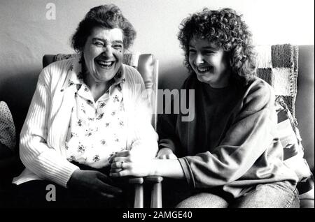 Carer and elderly woman in residential home for the elderly, Nottingham UK 1991 Stock Photo