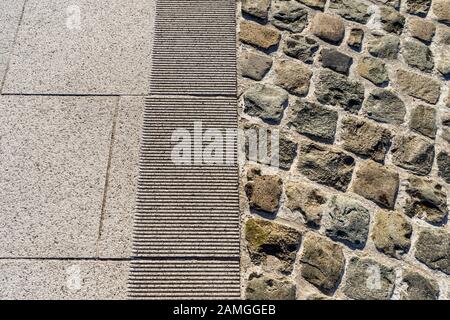 Paving stones and cobbles in Brussels street, Belgium. Stock Photo