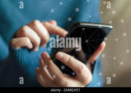 Woman hands using smartphone. Digital data network Stock Photo