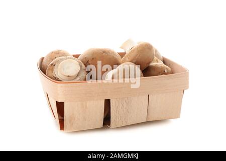 Champignon mushrooms in container isolated on white background Stock Photo