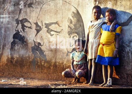 Vintage photo 35mm slide from 1993: african girl sit in front of a wall ...