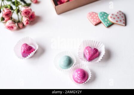 Gift set with hand made sweets in a box on a white table. Stock Photo