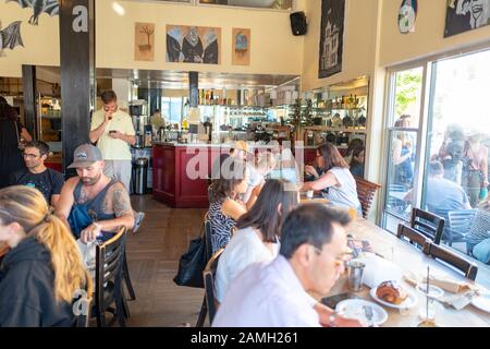 Large crowds of diners are visible inside Tartine Bakery in the Mission District neighborhood of San Francisco, California, widely considered among the best bakeries in the world , October 6, 2019. () Stock Photo