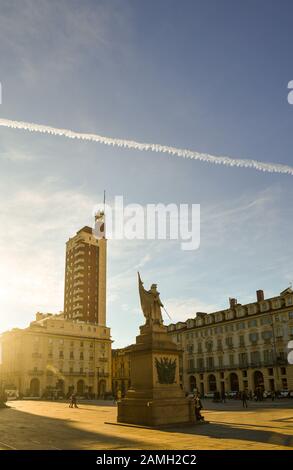 Piazza Castello square in the city centre with the Monument to the Soldier of Sardinian Army and the Littoria Tower skyscraper, Turin, Piedmont, Italy Stock Photo