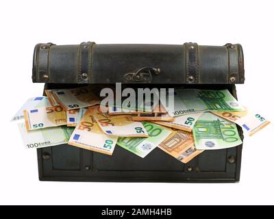 euro banknotes in old open wooden chest isolated on white background Stock Photo