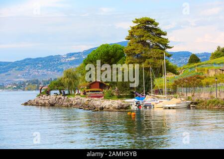 Montreux, Switzerland - October 12, 2019: Panoramic view of Lake Geneva, Switzerland and marina boat station Stock Photo