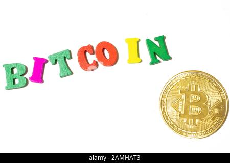 Word bitcoin made with letterboard and coin on white background top view Stock Photo