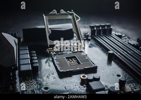 Close-Up of CPU Socket on a Modern Computer Motherboard. Electronic Small Component Details. PC repair or upgrade concept. Stock Photo