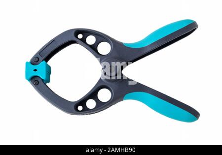Carpentry plastic clamps with blue handles isolated on white background. Clamping tools for joinery and photography. Hand tools for handicraft. Stock Photo