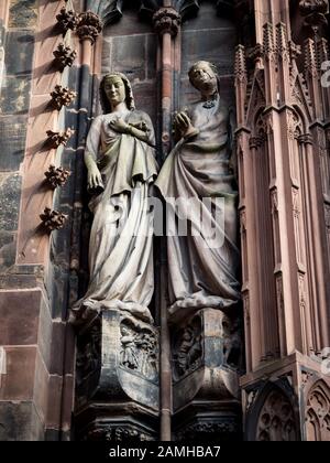 Details of the Strasbourg Cathedral. Architectural and sculptural elements of the facade and tower. France. Stock Photo