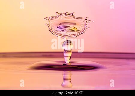 High speed water drop photograph with colliding drops Stock Photo