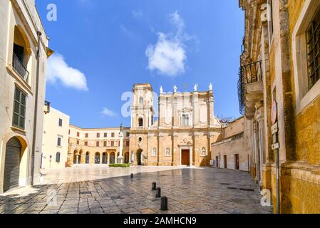 The piazza courtyard in front of St. John the Baptist Church also known as the Duomo Cathedral in the seaside town of Brindisi, Italy. Stock Photo