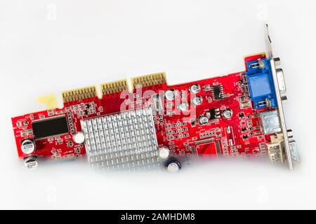 Video card computer sinking in white colored water Stock Photo