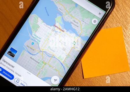 Map of Vancouver city on phone screen close-up top view with copy space Stock Photo