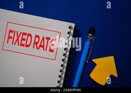 Fixed Rate write on a book isolated on blue background. Stock Photo