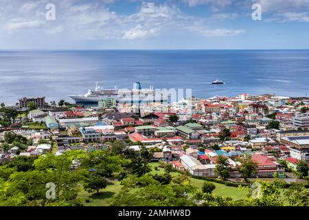 View of the Port of Roseau from Botanical Gardens, with docked Marella Celebration Cruise ship, Dominica, Windward Islands, West Indies, Caribbean Stock Photo