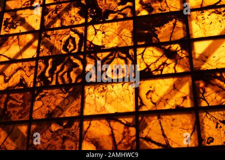 An abstract image of patterned sheet glass lit up Stock Photo