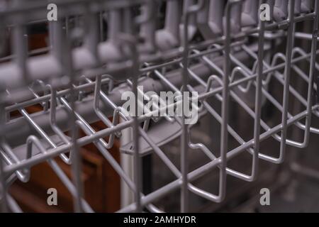 Dishwasher, gray mesh dishwasher Selective focus Stock Photo