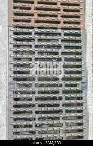 New sewer cover in the street Stock Photo