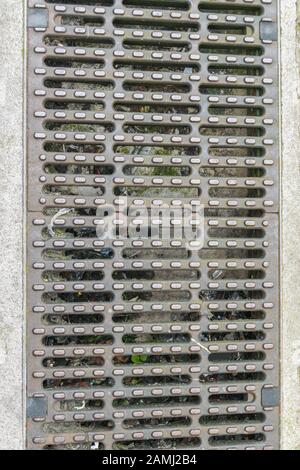 New sewer cover in the street Stock Photo