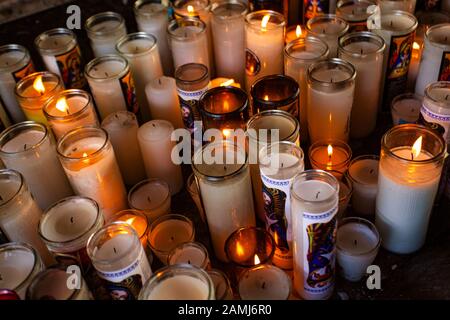 Many religious candles Stock Photo