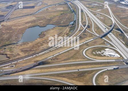 Salt Lake City airport and surrounding area view from window seat of an airplane on a summer day. Stock Photo
