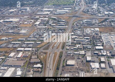 Salt Lake City airport and surrounding area view from window seat of an airplane on a summer day. Stock Photo