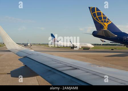 Airplanes on runway at George Bush Intercontinental Airport (IAH) in ...