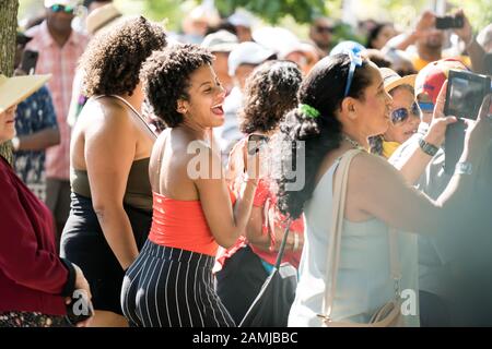 People dancing and enjoying the outdoor concert Stock Photo