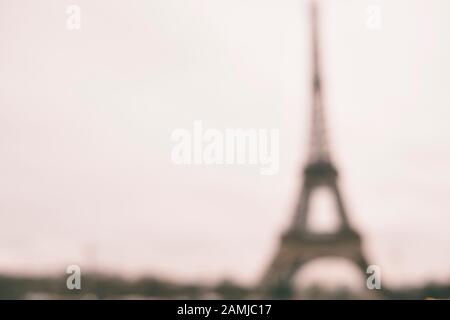 Blurry shot of the Eiffel Tower In Paris with copy space - Landscape - Monotone - Defocused Stock Photo