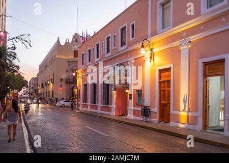 The facade of the Hotel Merida at dusk on Calle 60 in Merida, Yucatan, Mexico. Stock Photo