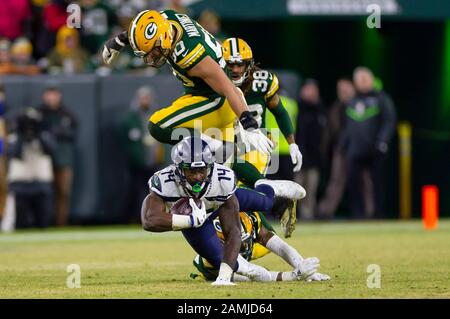 GREEN BAY, WI - NOVEMBER 14: Seattle Seahawks wide receiver DK Metcalf (14)  watches a ball pass behind him during a game between the Green Bay Packers  and the Seattle Seahawks at