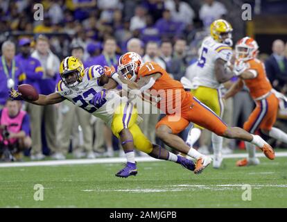 Clemson linebacker Isaiah Simmons (11) tackles Notre Dame running back  Dexter Williams (2) in the Goodyear Cotton Bowl College Football Playoff  semi-final game, Saturday, Dec. 29, 2018 in Arlington, Texas. Clemson beat