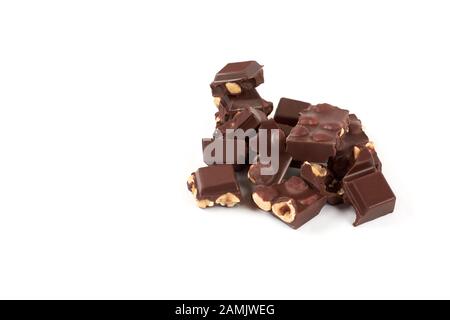 Chocolate pieces with nuts isolated on white background Stock Photo
