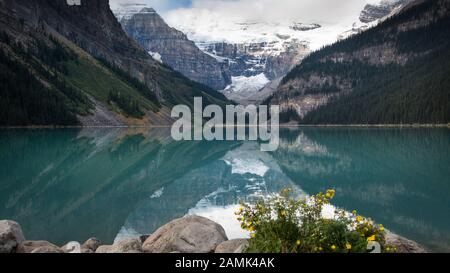 Lake Louise reflection in Banff National Park, Canadian Rockies Stock Photo