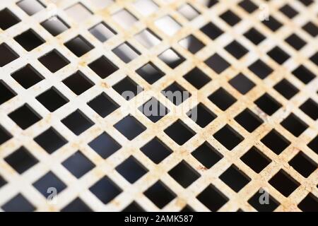 Metal background with rust flat squares. Image with depth of field. Stock Photo