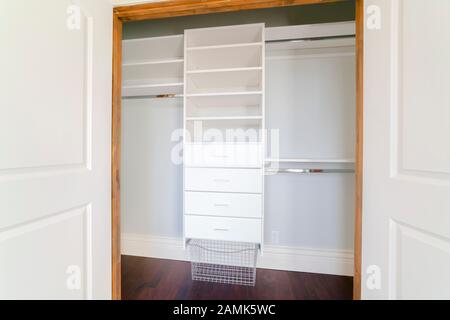 Empty shelves of a luxury walk-in closet Stock Photo