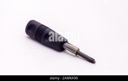 Phillips screwdriver with black plastic handle isolated on white background Stock Photo