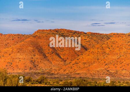 Sunset at Carmichael's Crag and the George Gill Range viewed from Kings Canyon Resort. Northern Territory, Australia Stock Photo