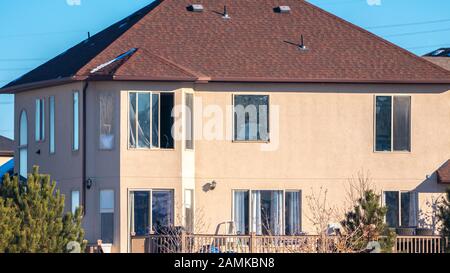 Panorama frame Two storey American house on sunny winter day Stock Photo