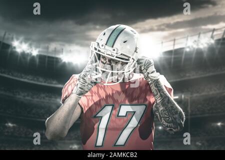 Close-up portrait of an american football player wearing helmet Stock Photo
