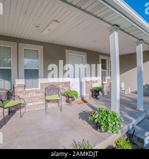 Square Covered entrance porch and door to a house Stock Photo - Alamy