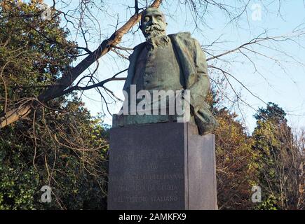 Milan, Italy: 23 December 2019: Statue of Giuseppe Giacosa in Indro Montanelli park, Milan, Lombardy, italy Stock Photo