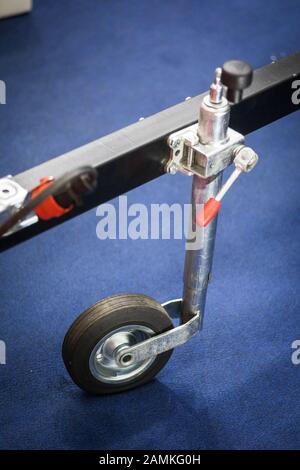 Trailer hook hitch with clipping mechanism and jockey wheel close up. Stock Photo