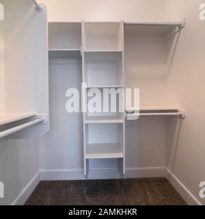 Square frame Fitted interior of a walk-in wardrobe bright interior Stock Photo
